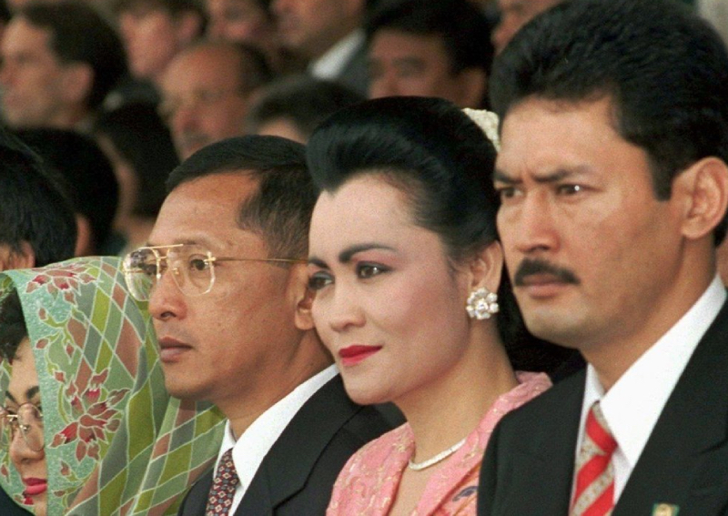 Why is a Singapore firm suing the children of Indonesian dictator